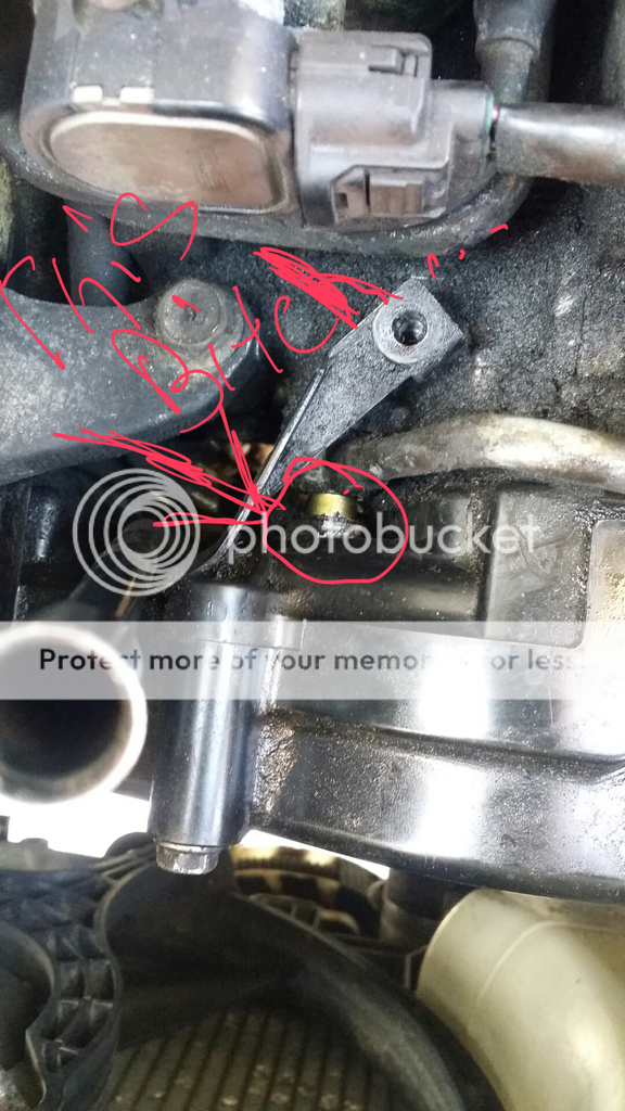 avcs filter screen removal. the one behind intake cam gear NASIOC